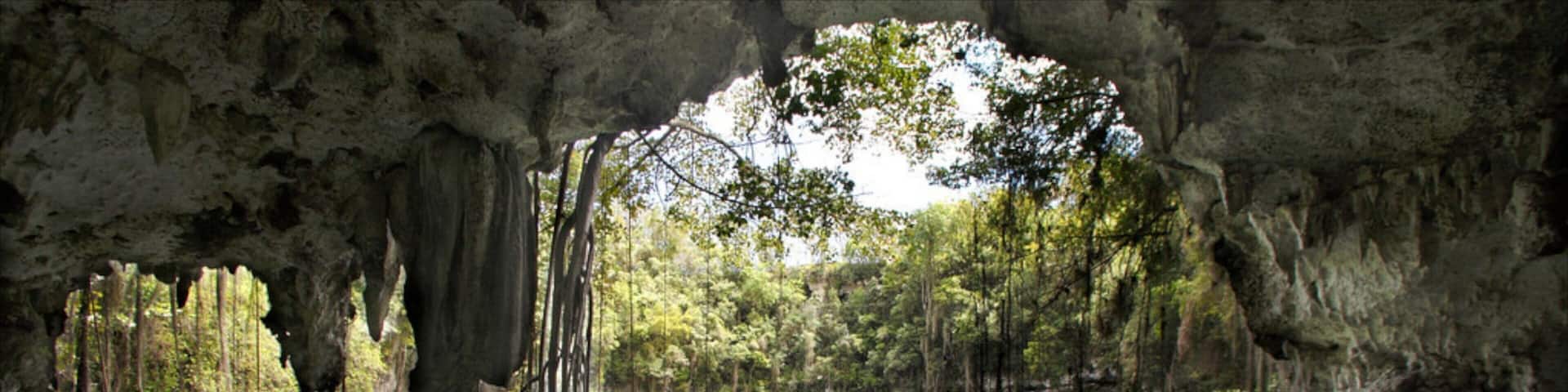 Dominican Republic which includes caves and a lake or waterhole