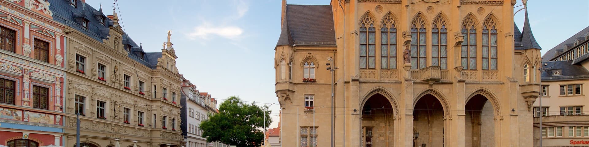 Rathaus showing heritage architecture, a sunset and a city
