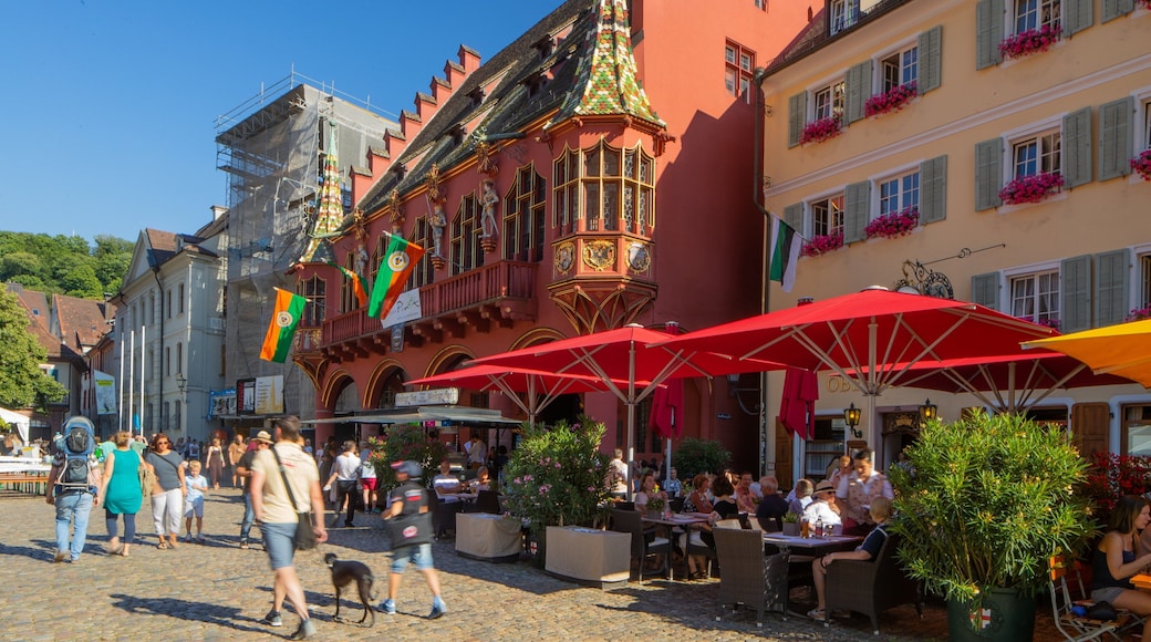 Historical Merchants\' Hall featuring outdoor eating, heritage elements and street scenes