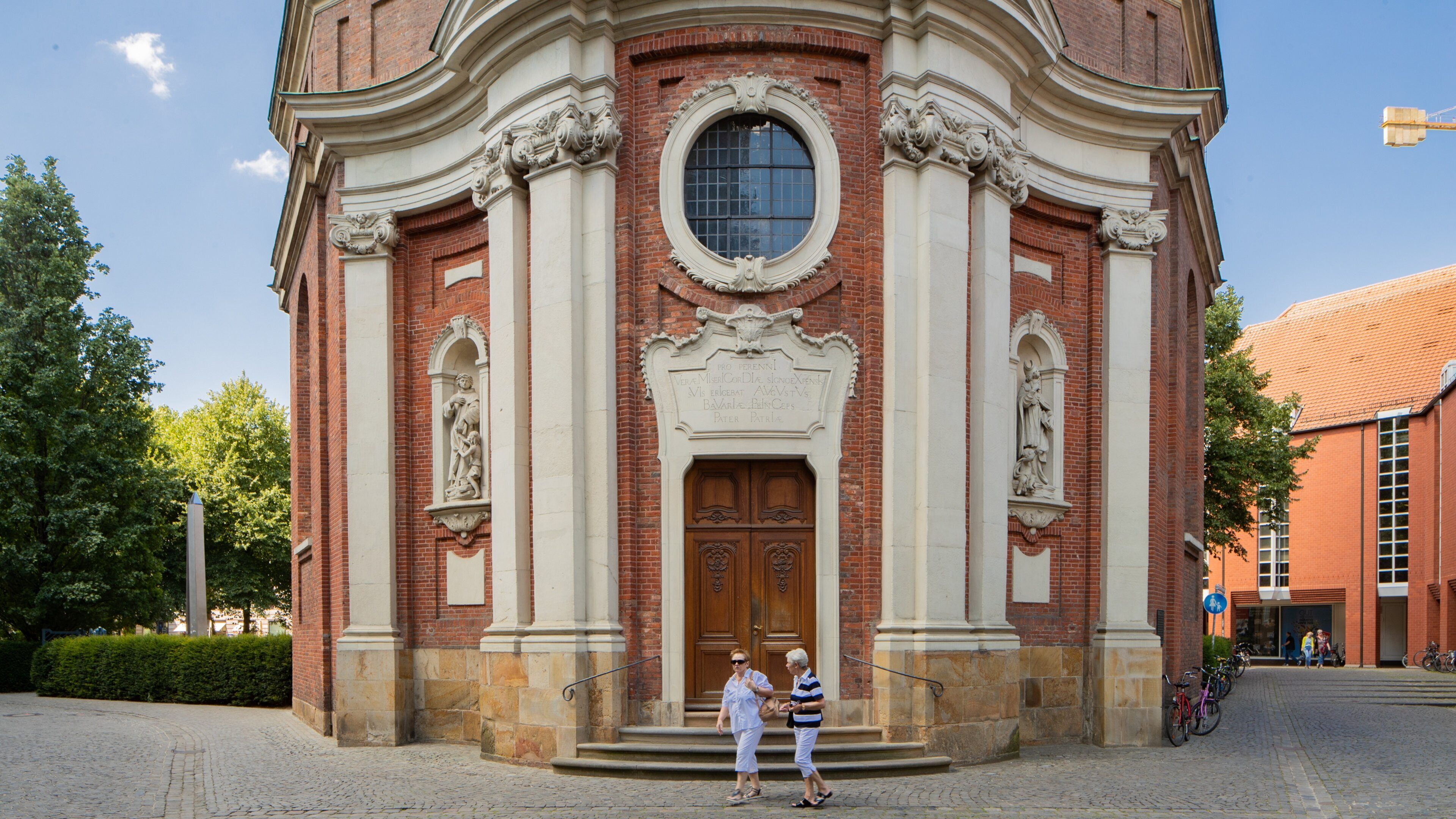 Clemenskirche showing heritage elements, a church or cathedral and street scenes