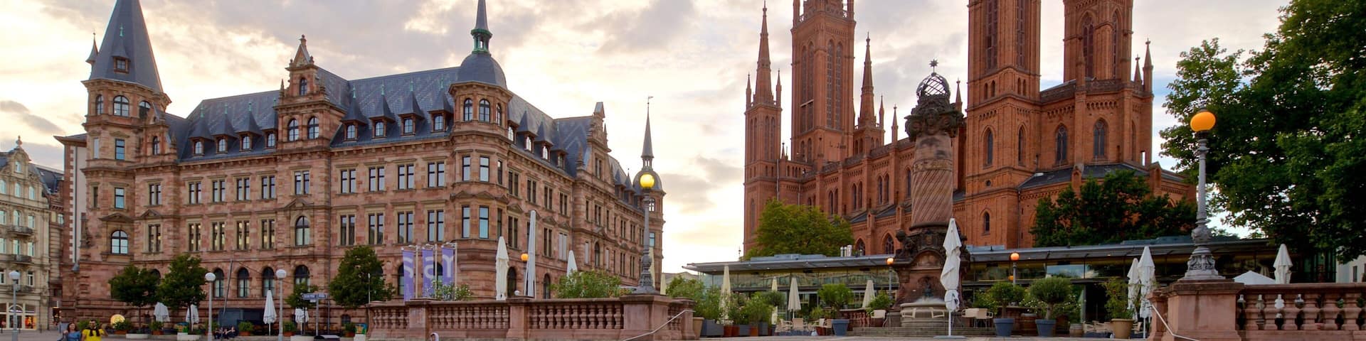 Marktbrunnen which includes a sunset, heritage architecture and a church or cathedral