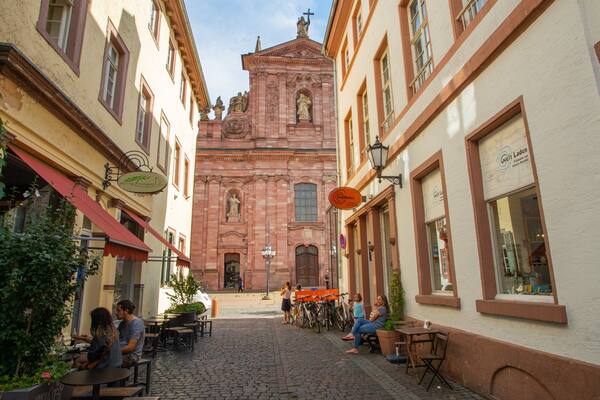 Jesuitenkirche which includes outdoor eating, heritage elements and a church or cathedral