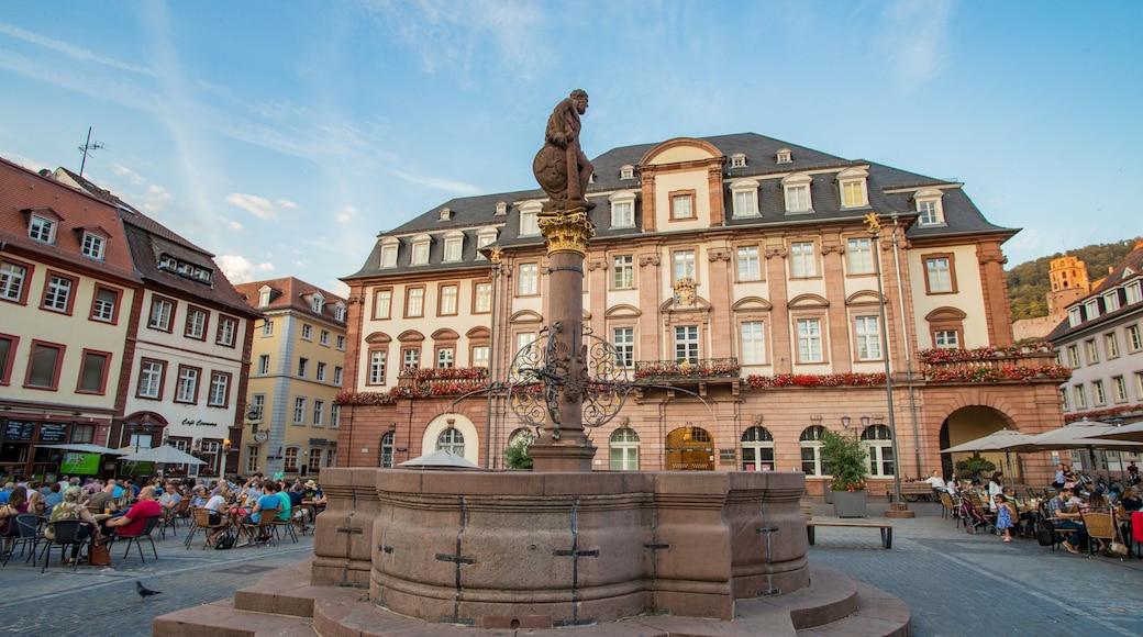 Hercules Fountain which includes a fountain, a city and outdoor eating
