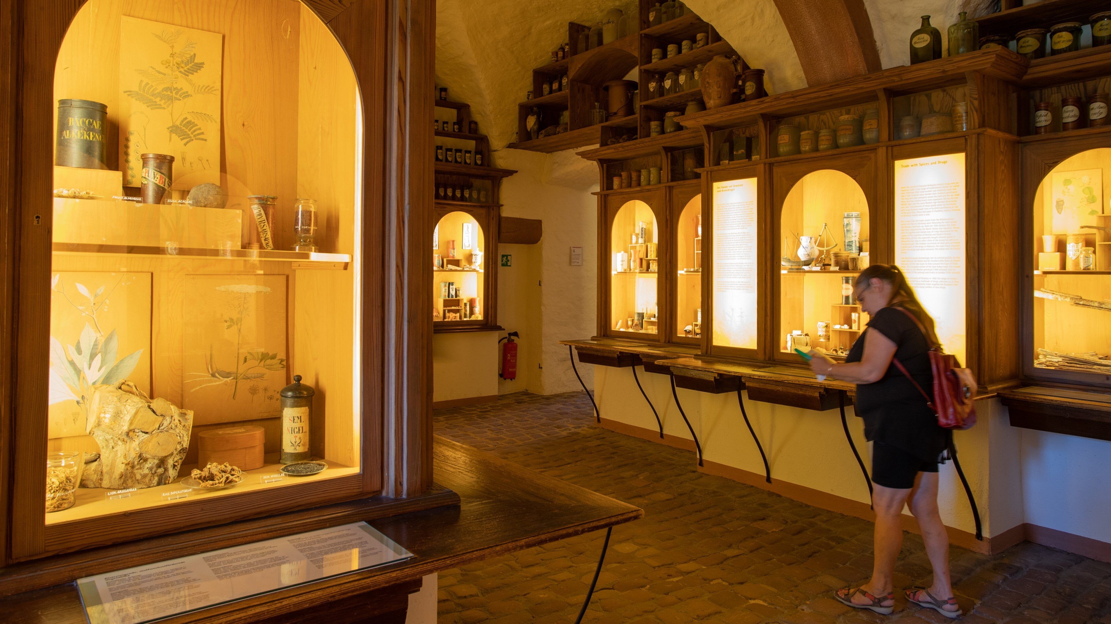 Deutsches Apotheken-Museum showing interior views as well as an individual femail