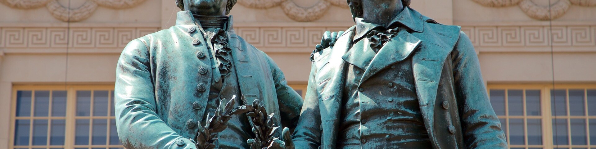 Goethe-Schiller Monument which includes heritage elements and a statue or sculpture