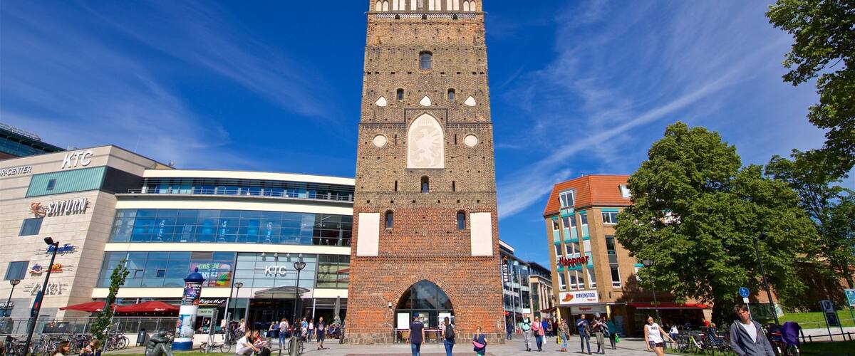 Kröpeliner Tor featuring street scenes and heritage architecture as well as a small group of people