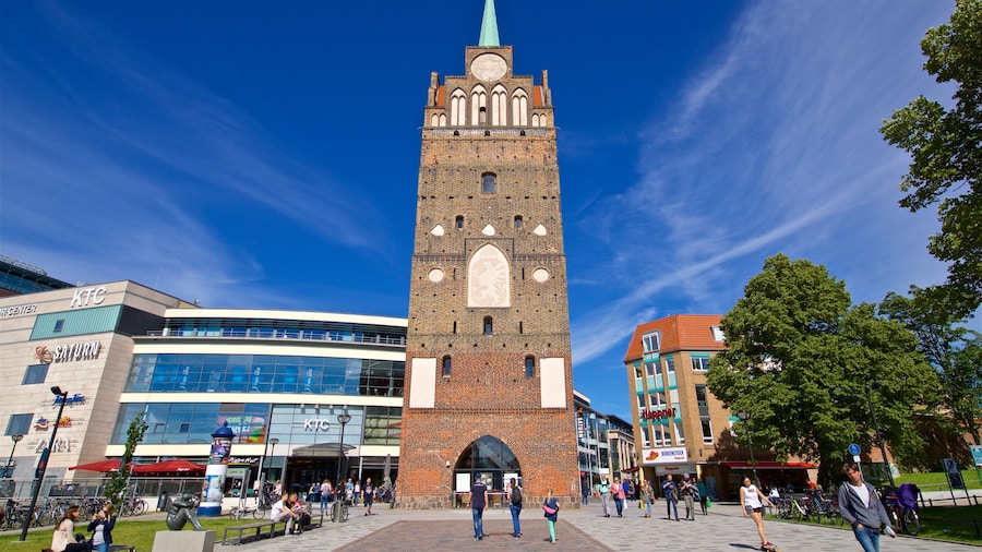 Kröpeliner Tor featuring heritage architecture and street scenes as well as a small group of people