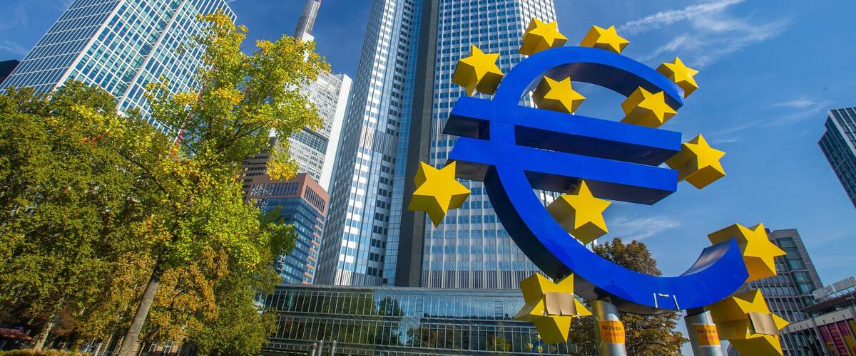 Euro Symbol showing a city, outdoor art and signage