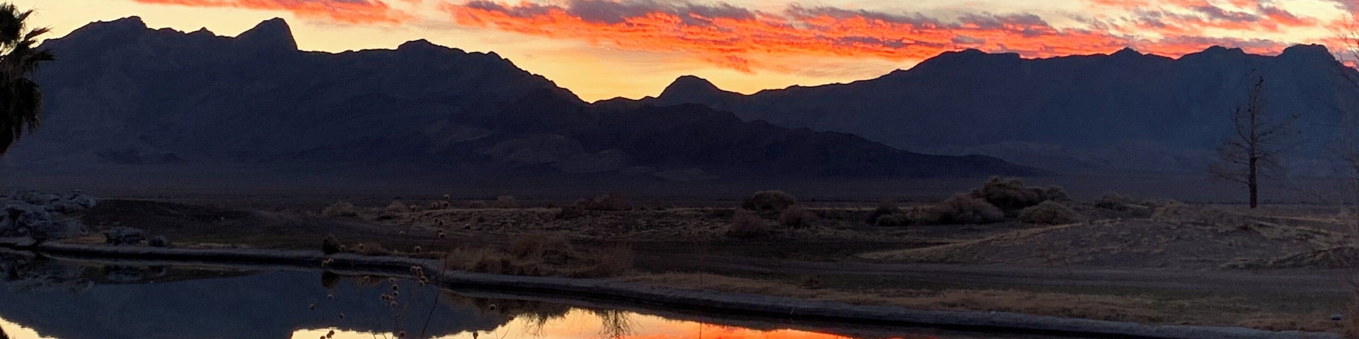 We really loved this RV park out in the middle of nowhere. It is right on the California/Nevada border and very convenient for visiting Death Valley. They do have a small convenience store, but stock up on groceries...you have to drive to Pahrump for major needs. The casino has a nice steak house and a cafe. They are VERY pet friendly. Oh, and youโll get beautiful sunsets like this one.