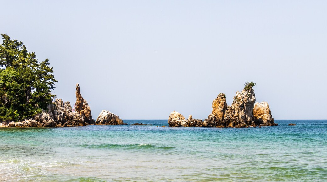 Panorama of Candlestick Rock, korean Chotdaebawi with clips and coastline. Donghae, Gangwon Province, South Korea, Asia.