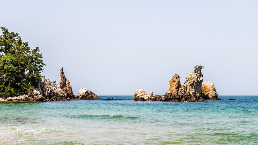 Panorama of Candlestick Rock, korean Chotdaebawi with clips and coastline. Donghae, Gangwon Province, South Korea, Asia.