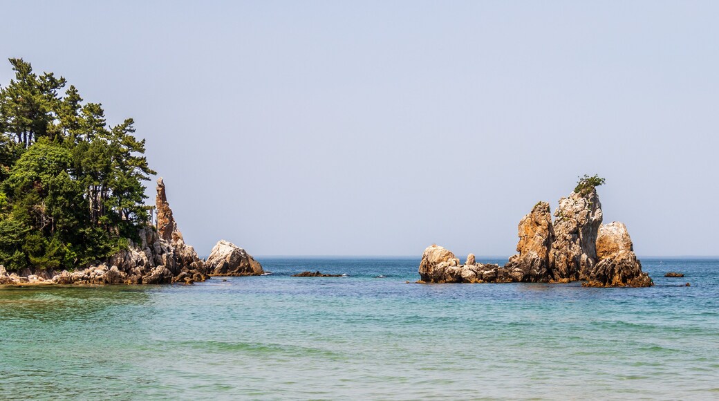 Chuam Beach with Candlestick Rock, korean Chotdaebawi with cliffs and coastline. Donghae, Gangwon Province, South Korea, Asia.