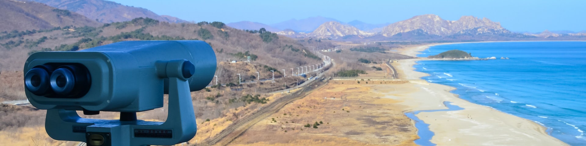 Binocular in the Goseong Unification Observatory with a background of beach and mountains.