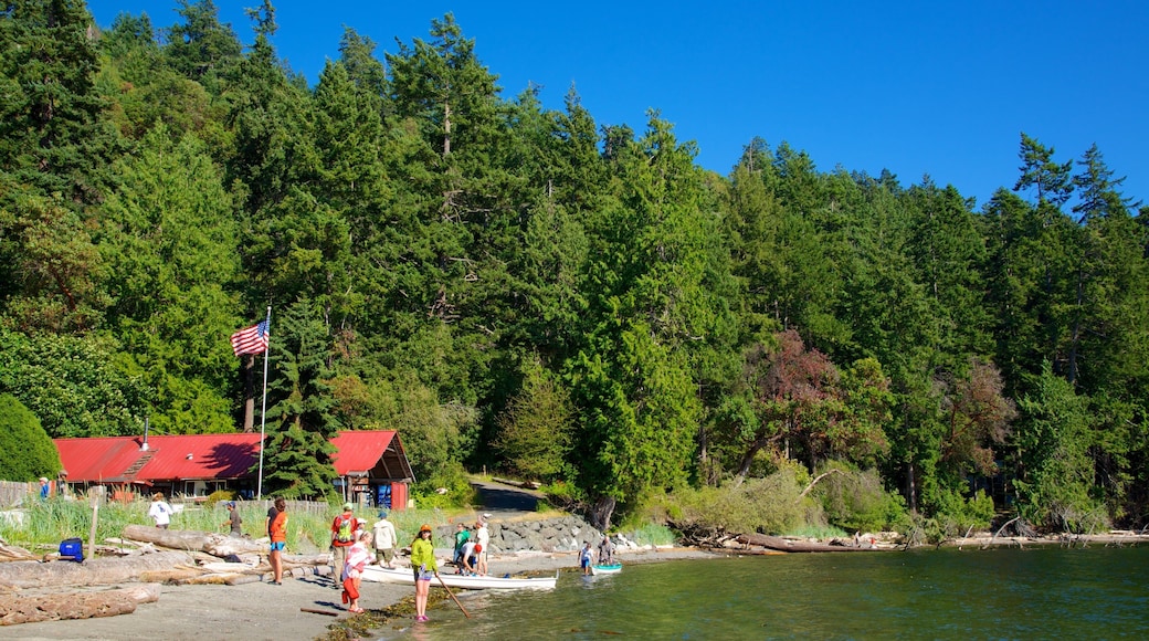 San Juan County Park showing a lake or waterhole as well as a small group of people