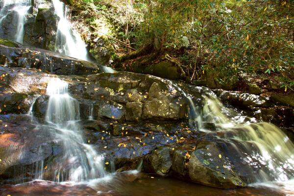 Great Smoky Mountains National Park featuring a river or creek and a cascade
