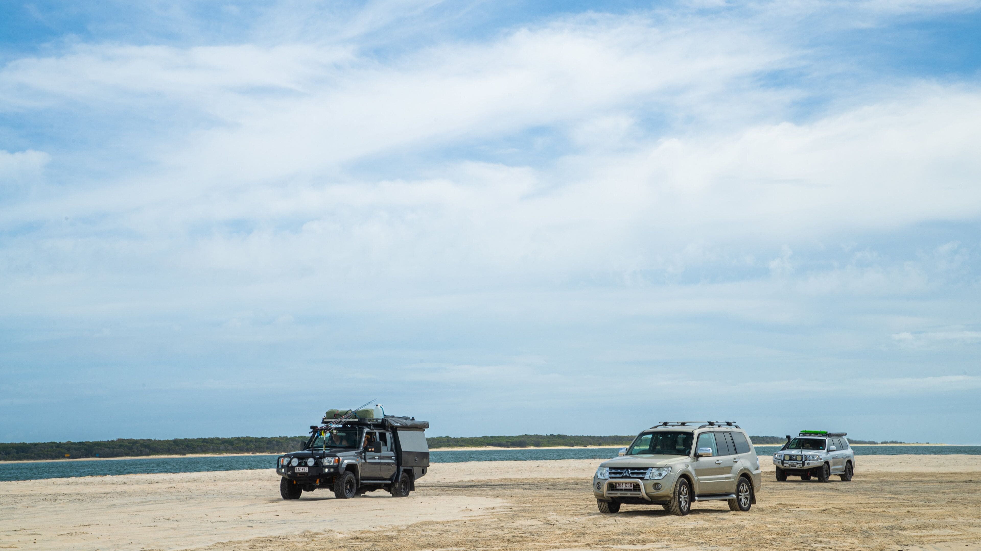 Inskip Point featuring a beach, general coastal views and 4 wheel driving