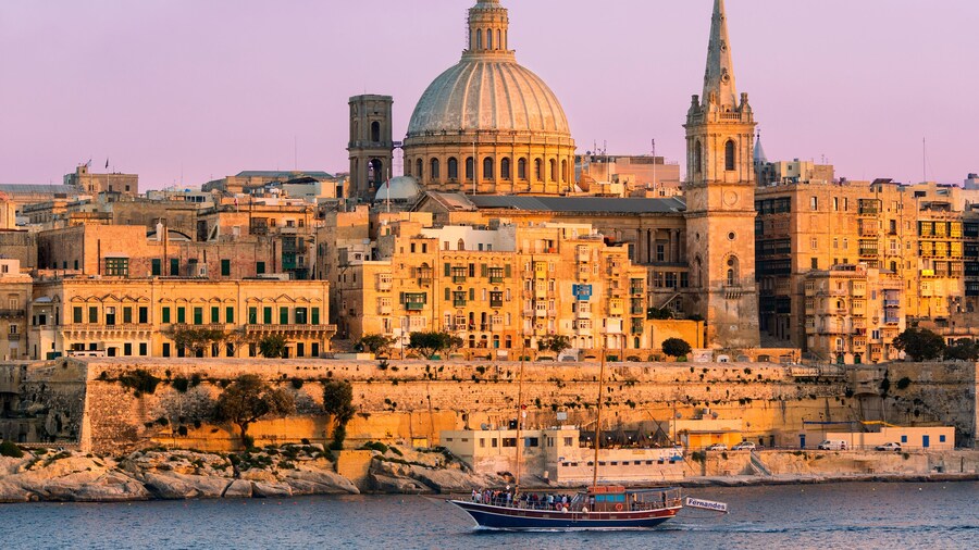 Malta, Valletta, skyline with St. Paul's Anglican Cathedral and Carmelite Church from Sliema.