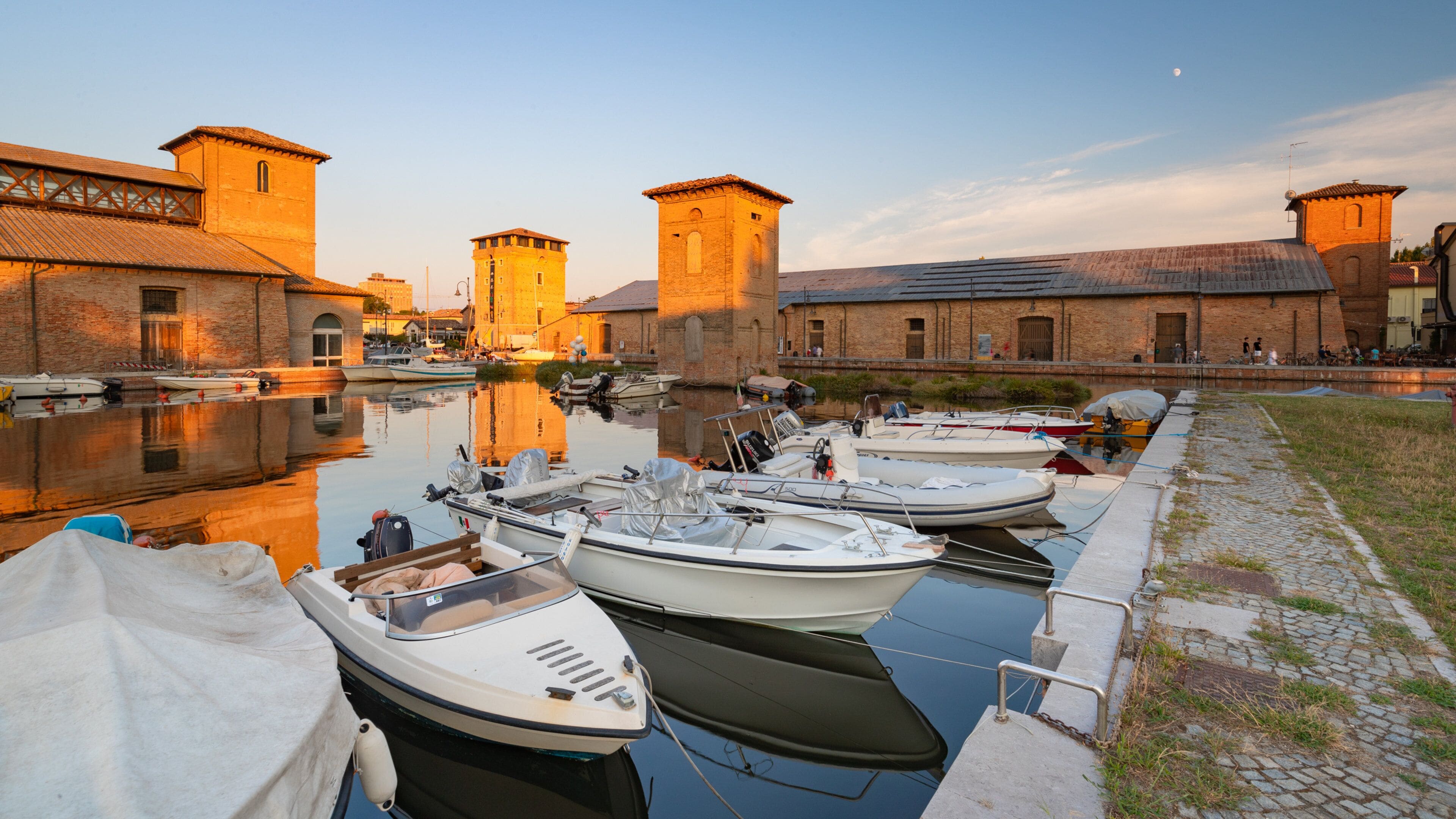 Emilia-Romagna showing a river or creek, heritage elements and a sunset