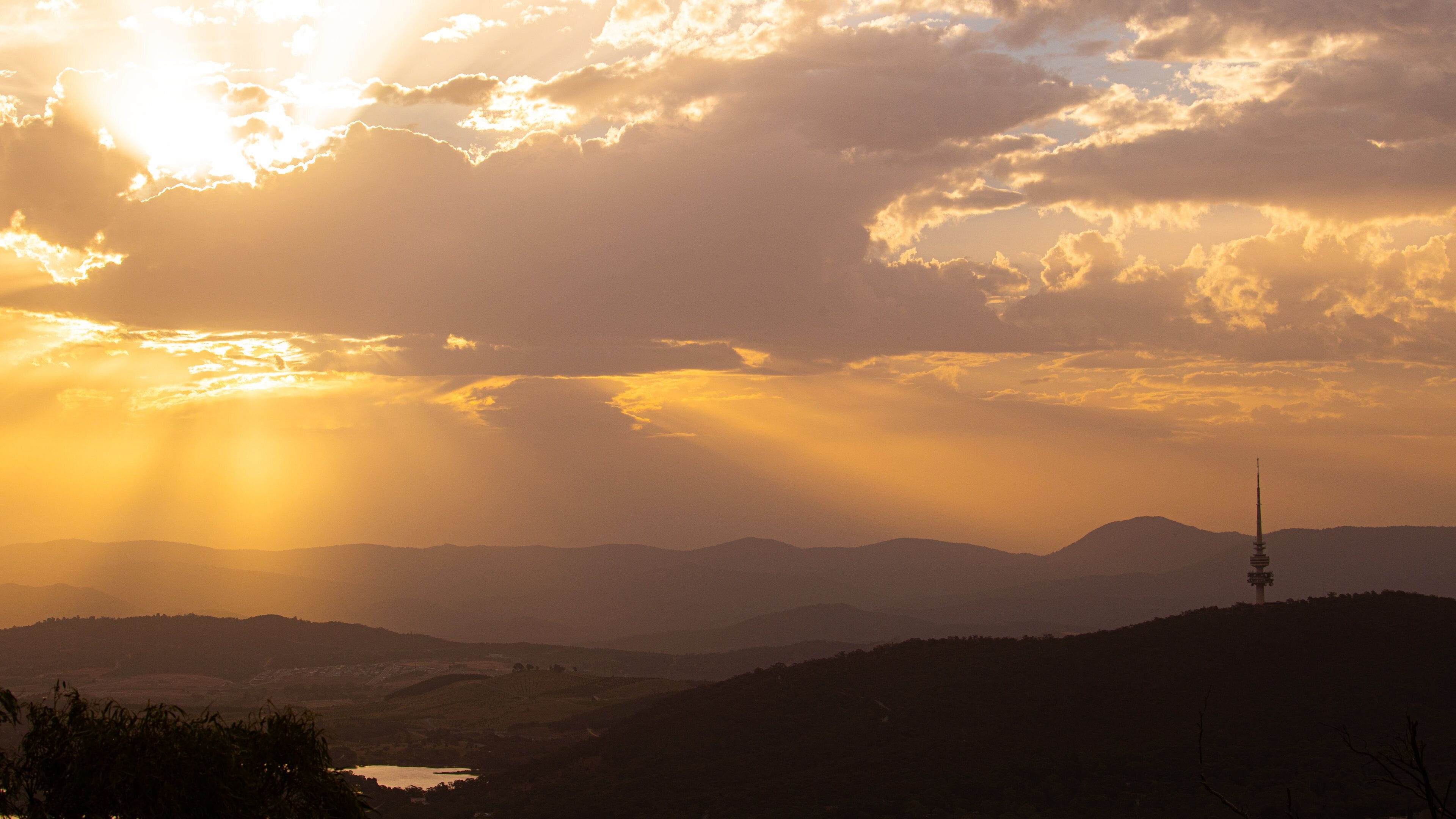 Mount Ainslie which includes landscape views, a sunset and tranquil scenes
