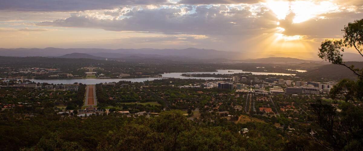 Mount Ainslie featuring a city, landscape views and a sunset