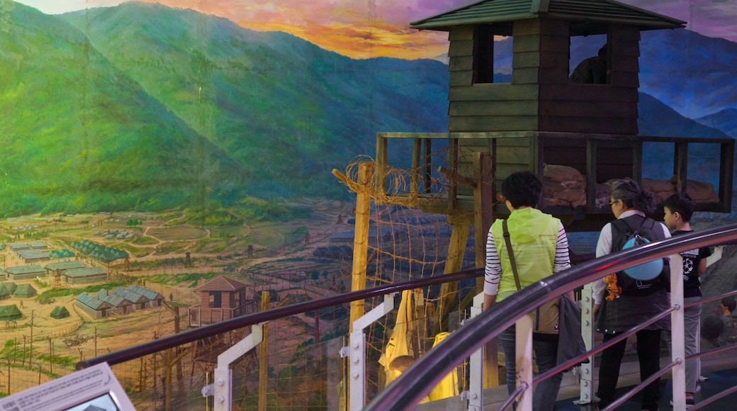 Geoje POW Camp which includes interior views as well as a family