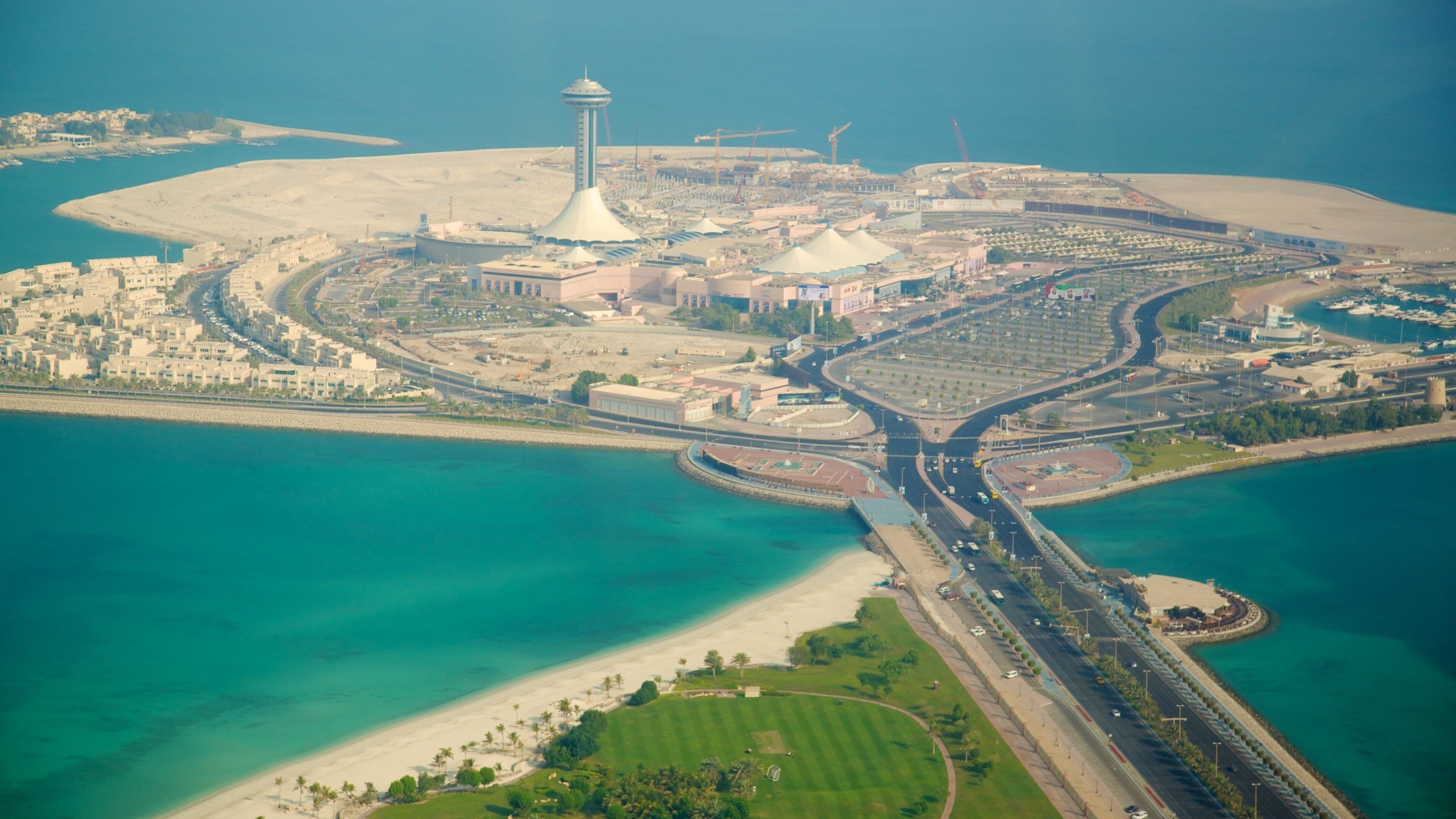 Abu Dhabi Emirate showing a coastal town and a city