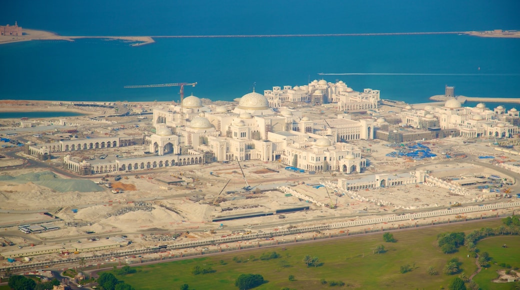 Etihad Towers showing a city and a coastal town