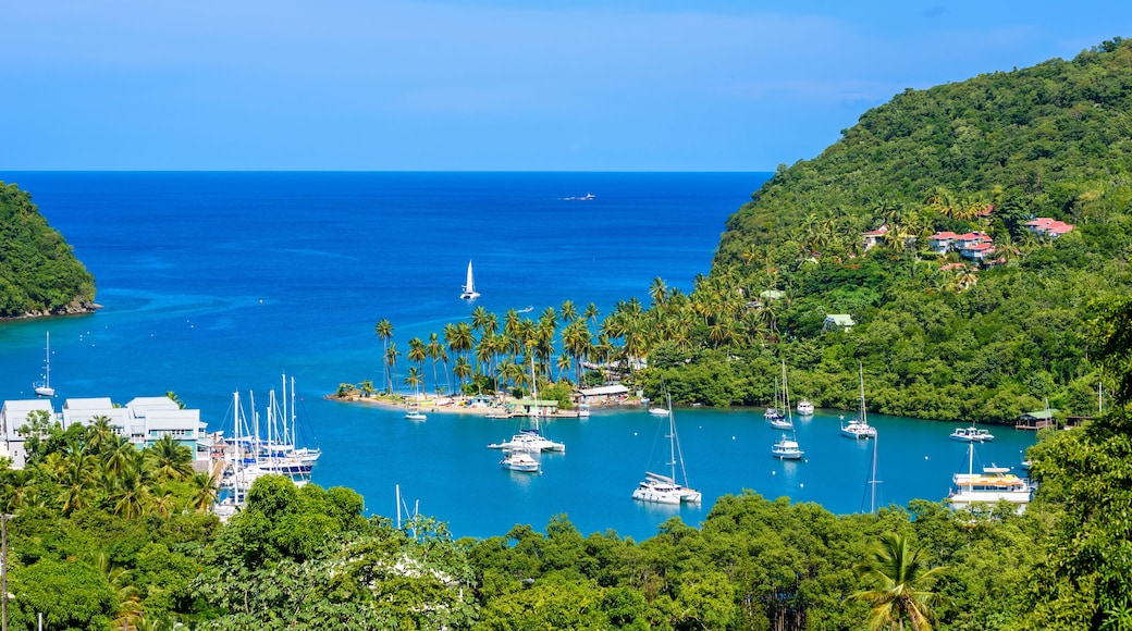 Marigot Bay, Saint Lucia, Caribbean. Tropical bay and beach in exotic and paradise landscape scenery. Marigot Bay is located on the west coast of the Caribbean island of St Lucia.