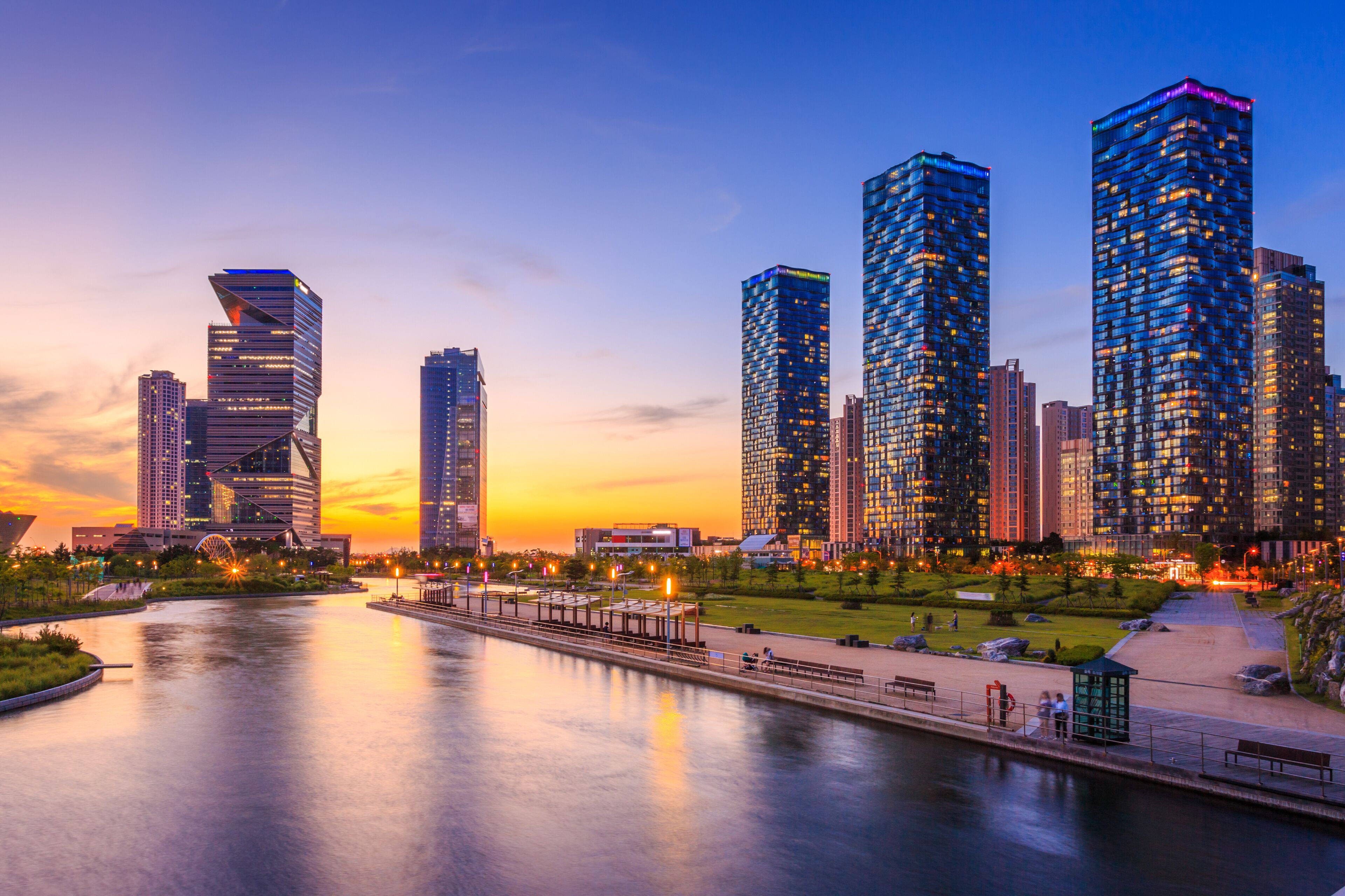 Seoul city with Beautiful after sunset and Skyscraper, Central park in Songdo District, Incheon South Korea.