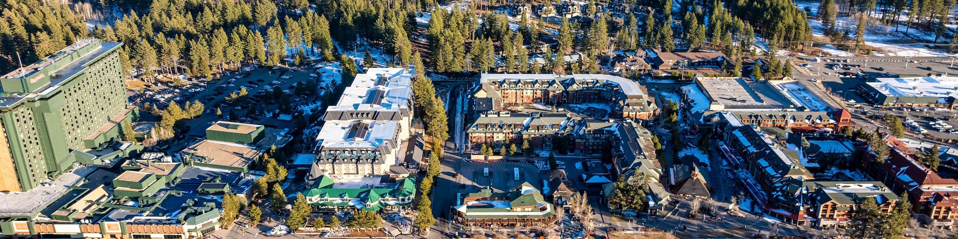 Stateline, NV - January 29, 2025: Daytime winter aerial image over Stateline, NV - South Lake Tahoe, CA at Lake Tahoe, how has weather impacted tourism business of hotels, resorts, and casinos.