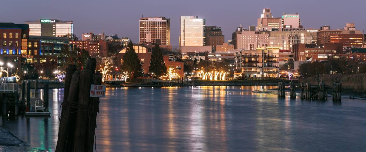 Wilmington Riverwalk showing night scenes and a river or creek