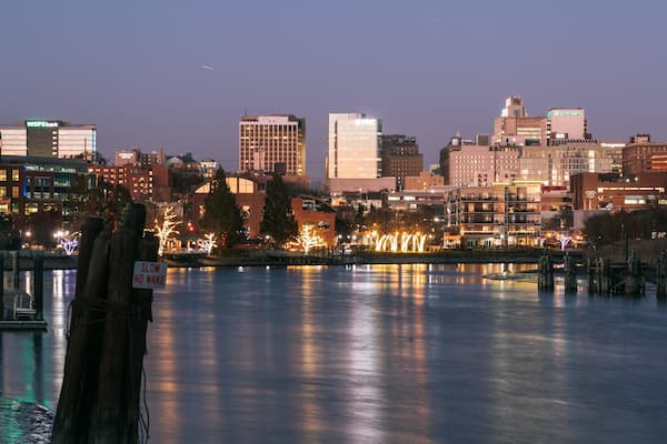 Wilmington Riverwalk showing night scenes and a river or creek