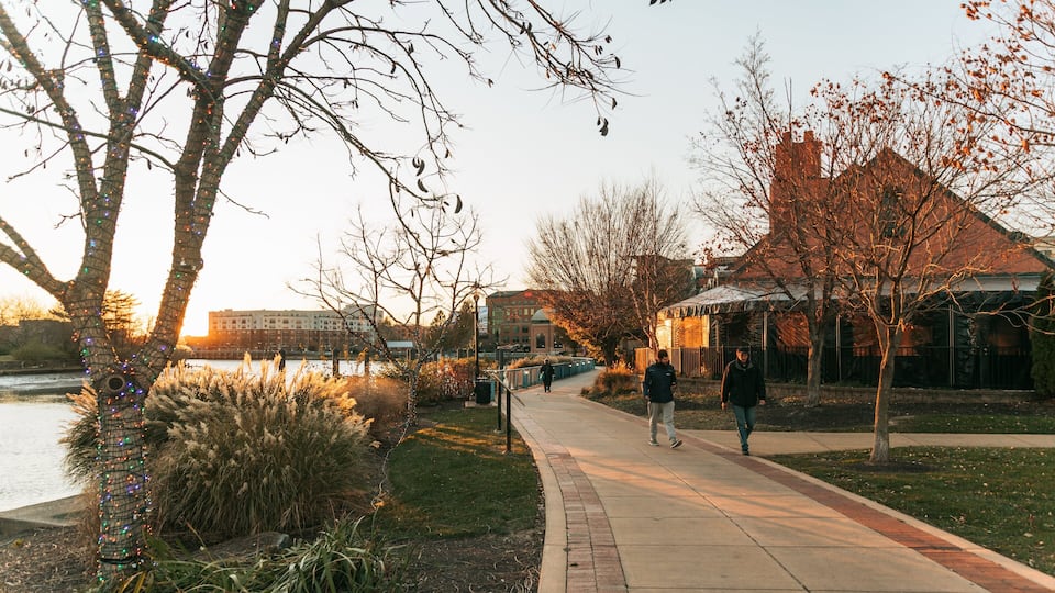 Wilmington Riverwalk which includes a garden and a sunset