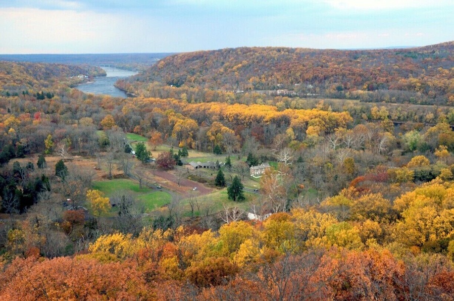 View North from top of Bowmen's Tower, Washington's Crossing, Pa
Bowman's Hill Tower, (1776-1930; also known as Bowman's Tower), is a 125-foot-tall (38 m) stone tower located in Washington Crossing Historic Park in Bucks County, Pennsylvania. It is administered by the Pennsylvania Historical Museum Commission. The tower was built on Bowman's Hill, which is on the dividing line between the Upper Makefield Township,and Solebury Township. There is a commemorative concrete inscription adorning the Tower above the entrance with its lifespan
