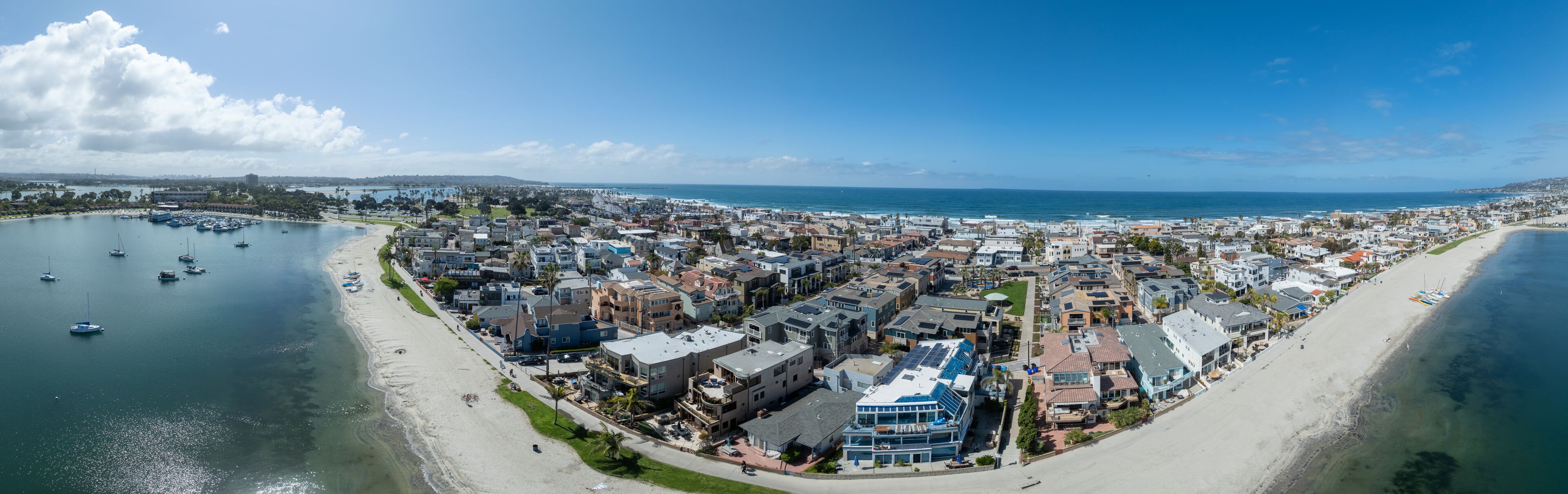 Aerial view of Mission Beach in San Diego California with sandy beach and vacation rental houses