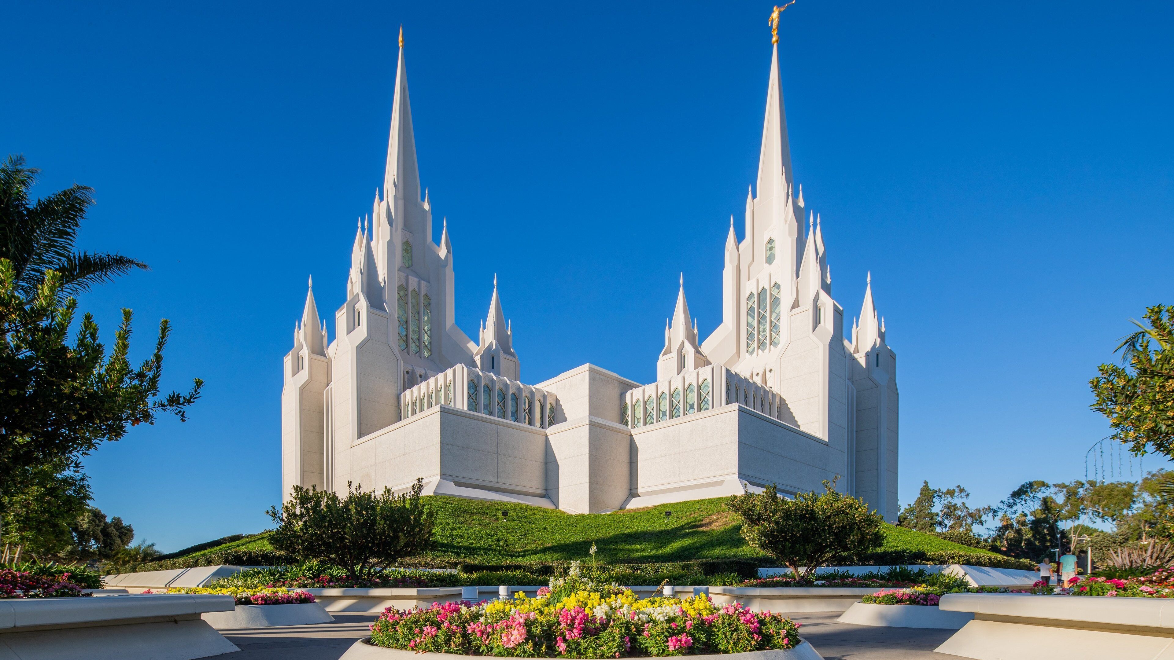 San Diego Mormon Temple featuring flowers, a park and a church or cathedral