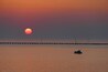 ... breathtaking sunset over the 24 miles long bridge (causeway) that was until recently in Guinness book as the longest bridge over water in the world