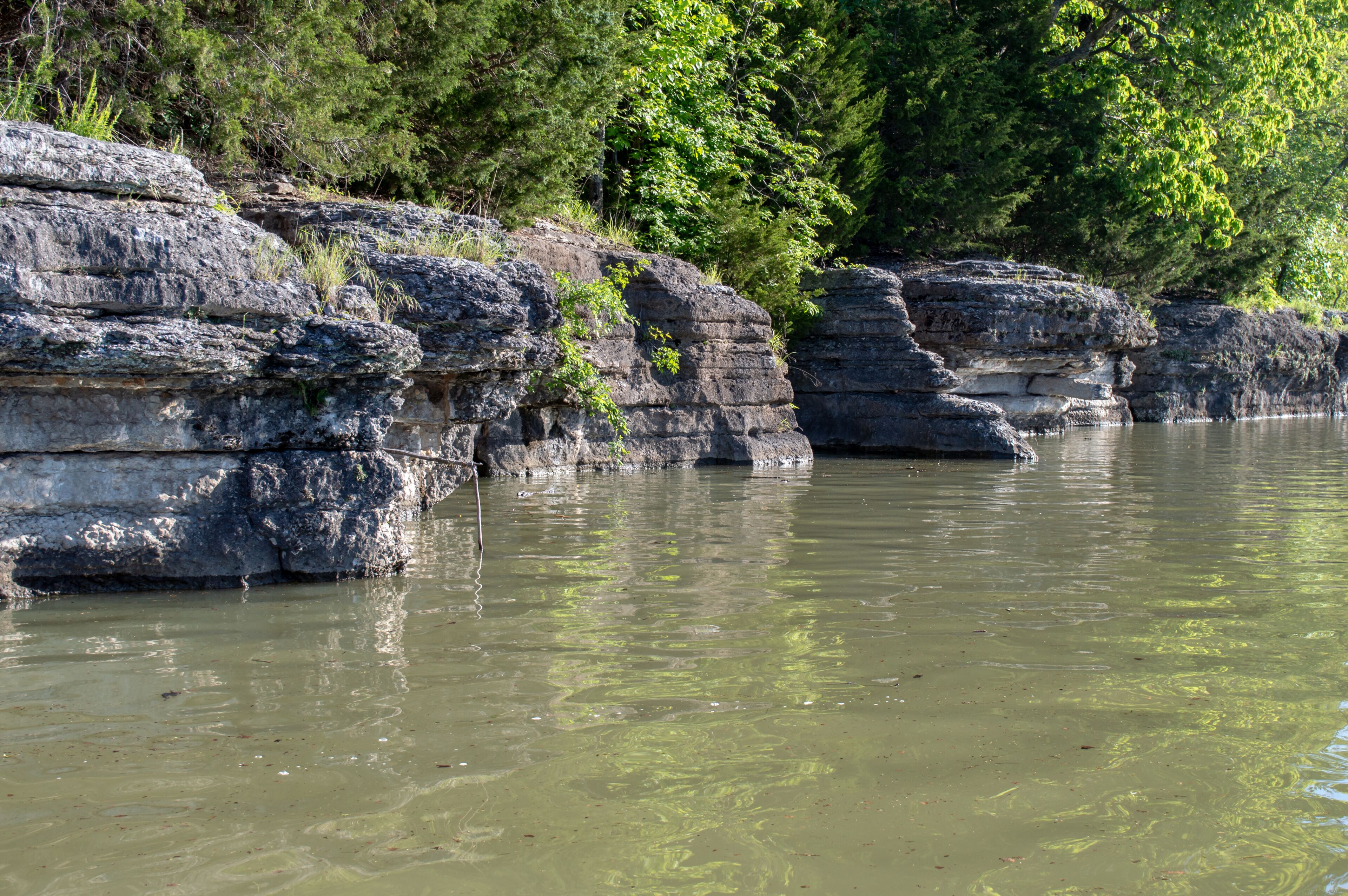 Rock cliffs at lake Eucha in Oklahoma makes a beautiful scenic view and an outstanding spot for limb line fishing. Bokeh.