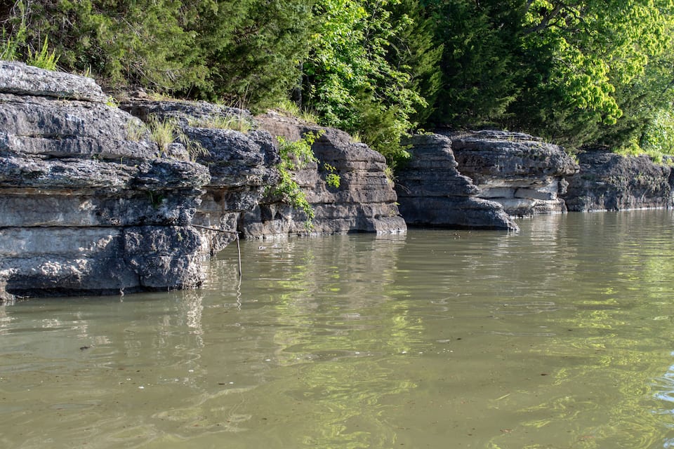Rock cliffs at lake Eucha in Oklahoma makes a beautiful scenic view and an outstanding spot for limb line fishing. Bokeh.