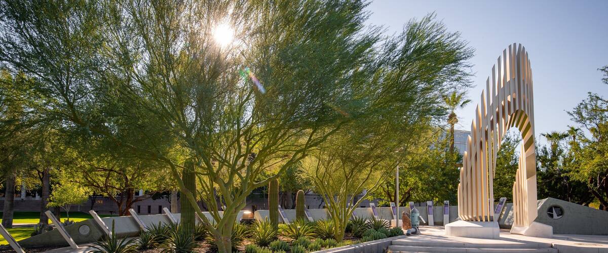 Wesley Bolin Memorial Plaza showing a garden and a sunset