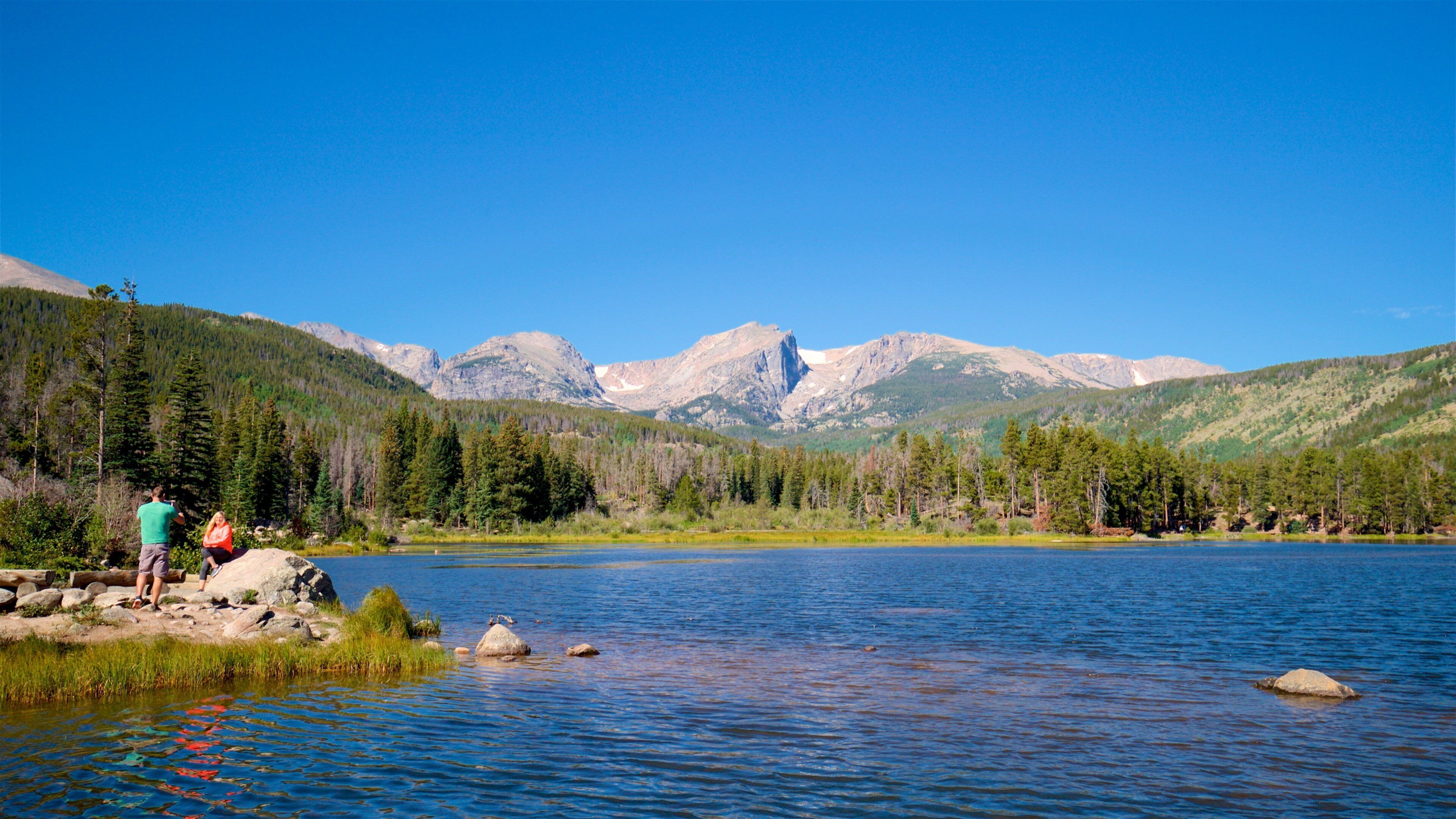 Estes Park featuring a lake or waterhole as well as a couple