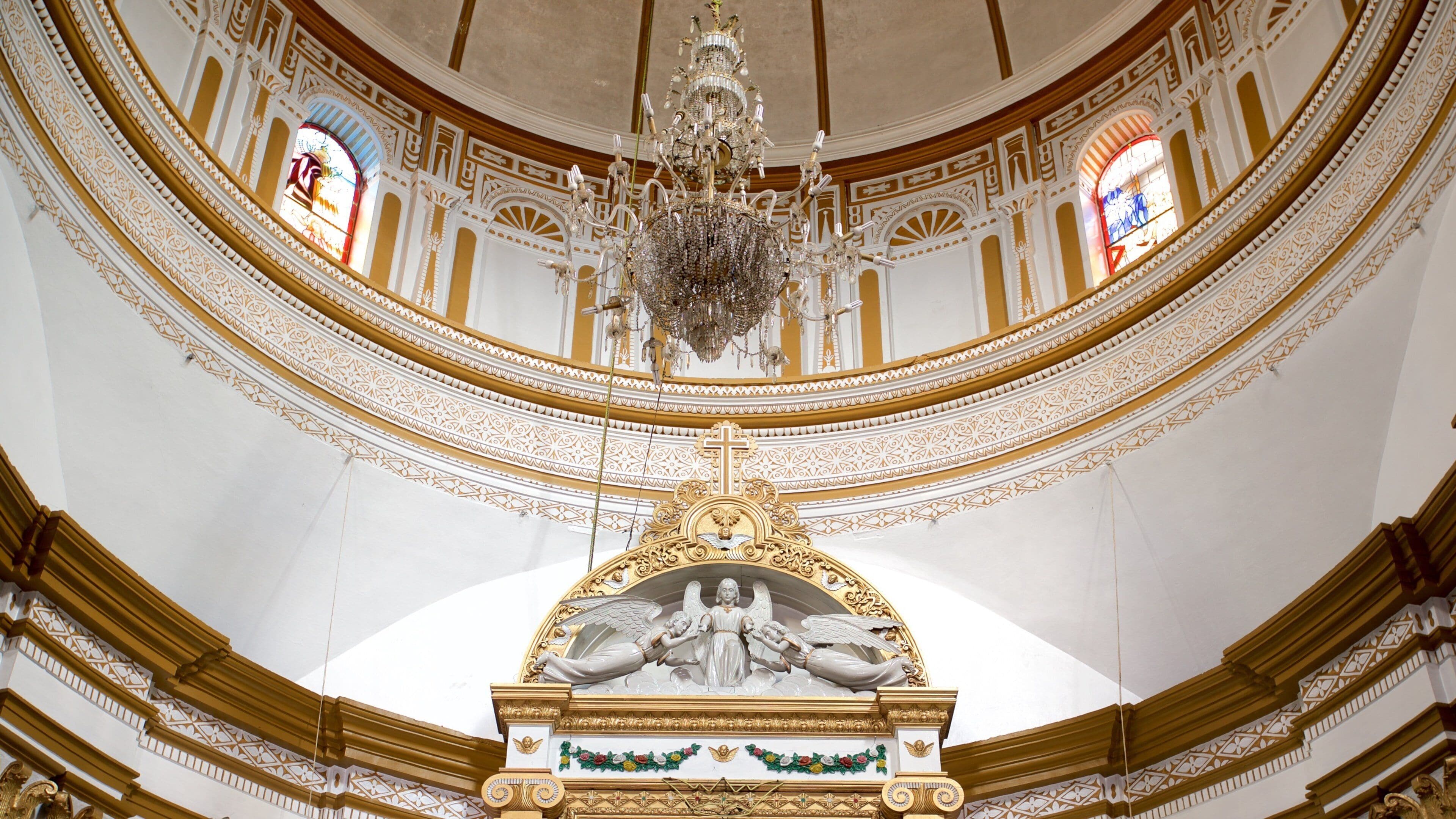Guadalupe Church showing a church or cathedral, heritage elements and interior views