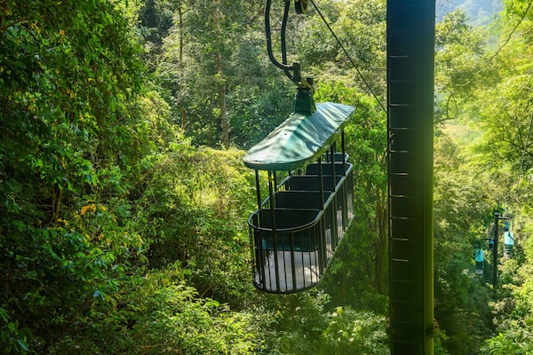 Cable car cabin riding through the tropical rainforest near Jaco in Costa Rica