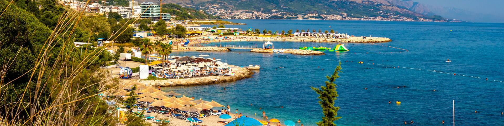 Popular turist beach trstenik znjan, summer people swimming having fun