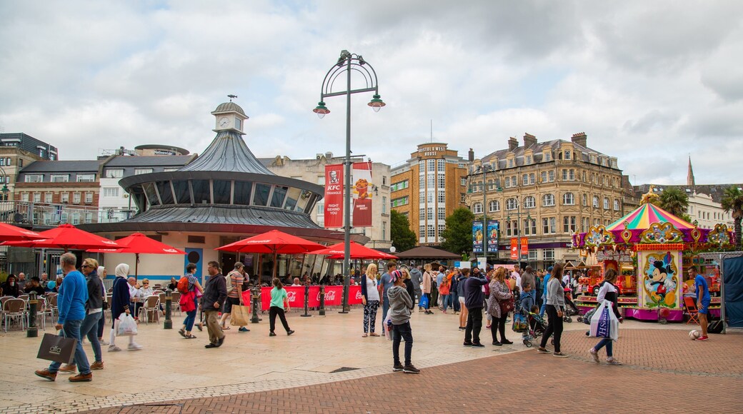 The Square which includes street scenes as well as a large group of people