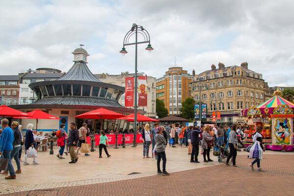 The Square which includes street scenes as well as a large group of people