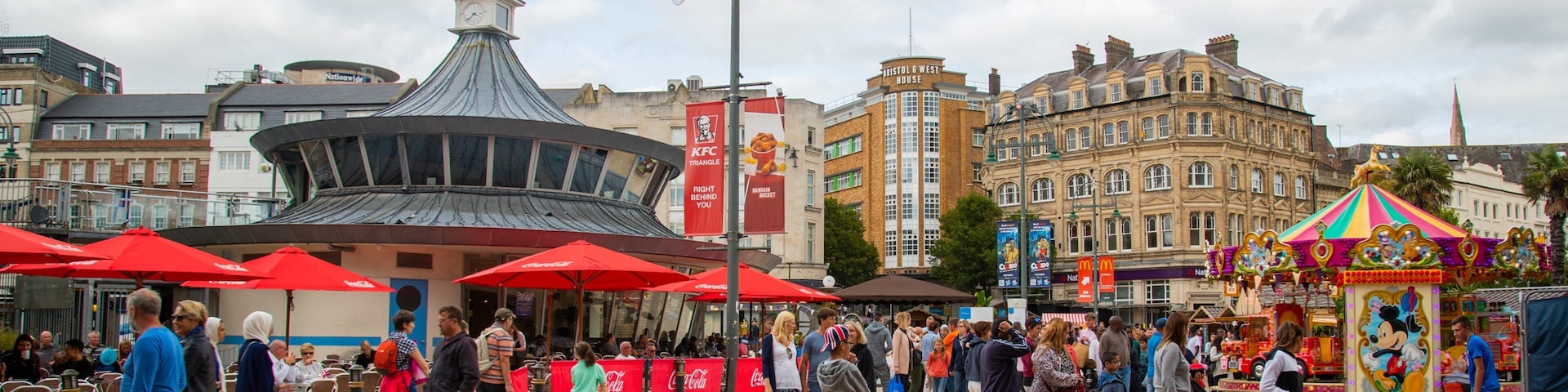 The Square which includes street scenes as well as a large group of people