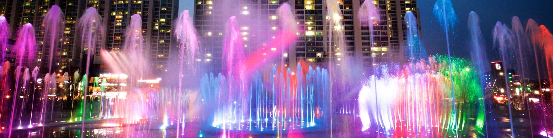 Traumbrunnen Dadaepo Sunset mit einem Springbrunnen, Stadt und bei Nacht