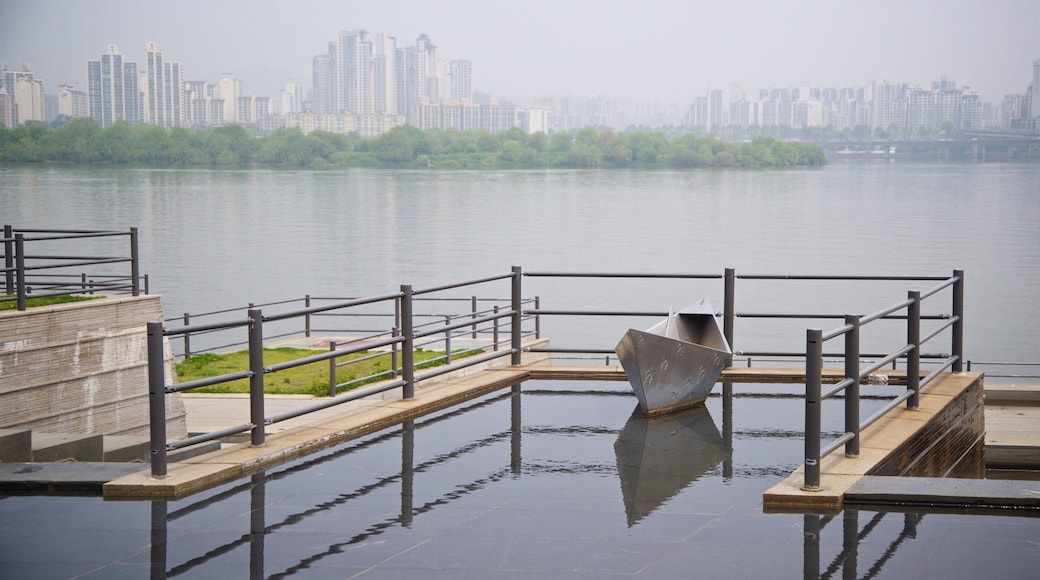 Yeouido Hangang Park featuring outdoor art, mist or fog and a river or creek