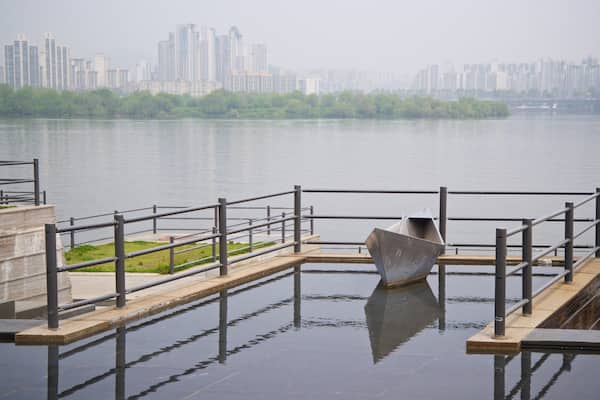 Yeouido Hangang Park featuring outdoor art, mist or fog and a river or creek